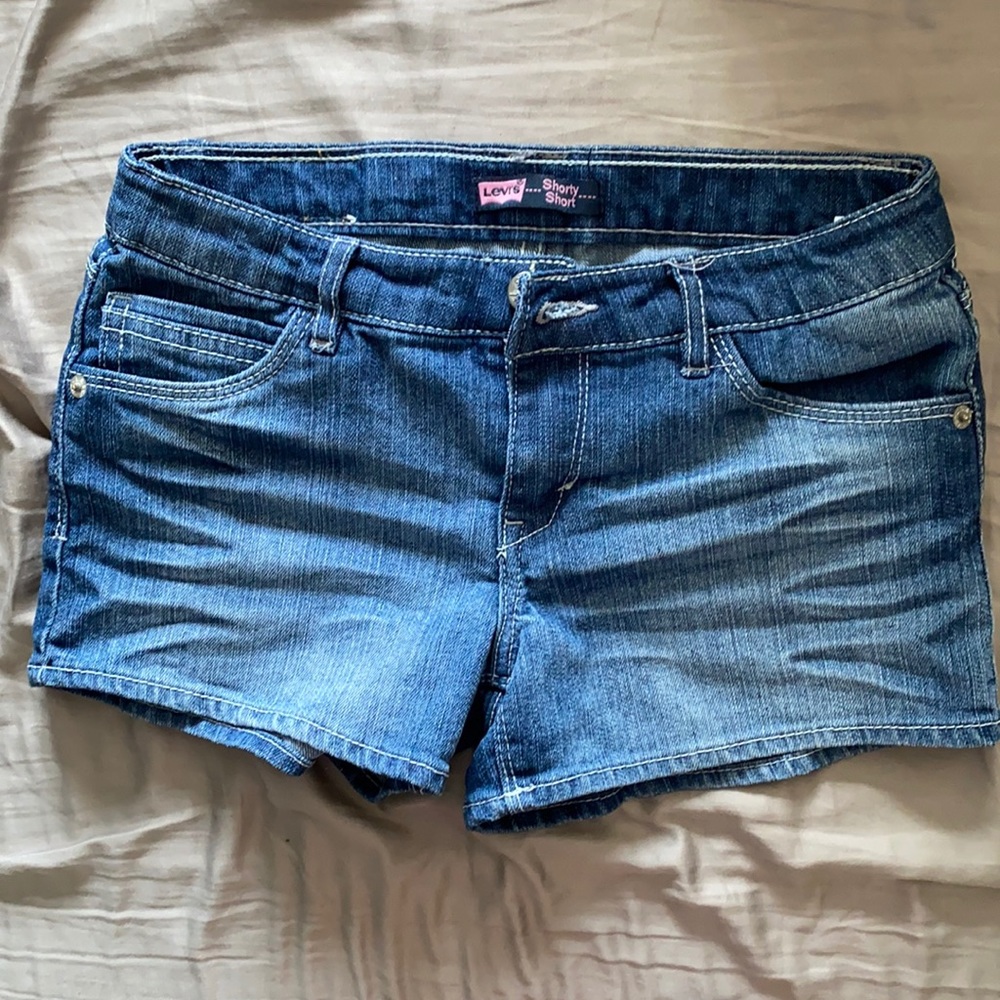 Shorty denim shorts by Levi’s. Size 14. Adj waist